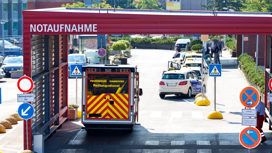 An ambulance stands in front of the entrance to the MHH emergency room.