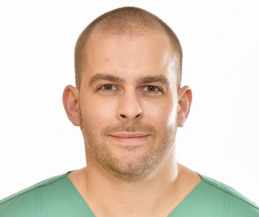 Porträtbild von Tim Heusinger von Waldegg