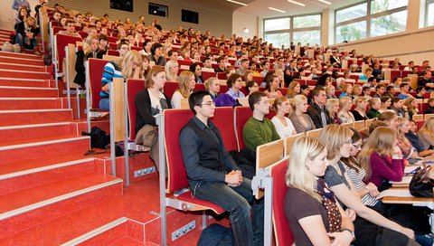 Students sitting at a lecture in lecture hall F