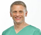 Portraitfoto von Dr. Daniel Benjamin Jäger.