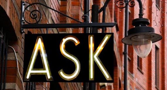Copyright: Dean Moriarty/Pixabay_a sign on a brick wall, stating Ask in neon light. Above that sign is a lamp.