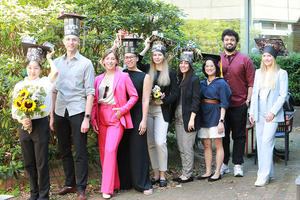 PhD students with hat