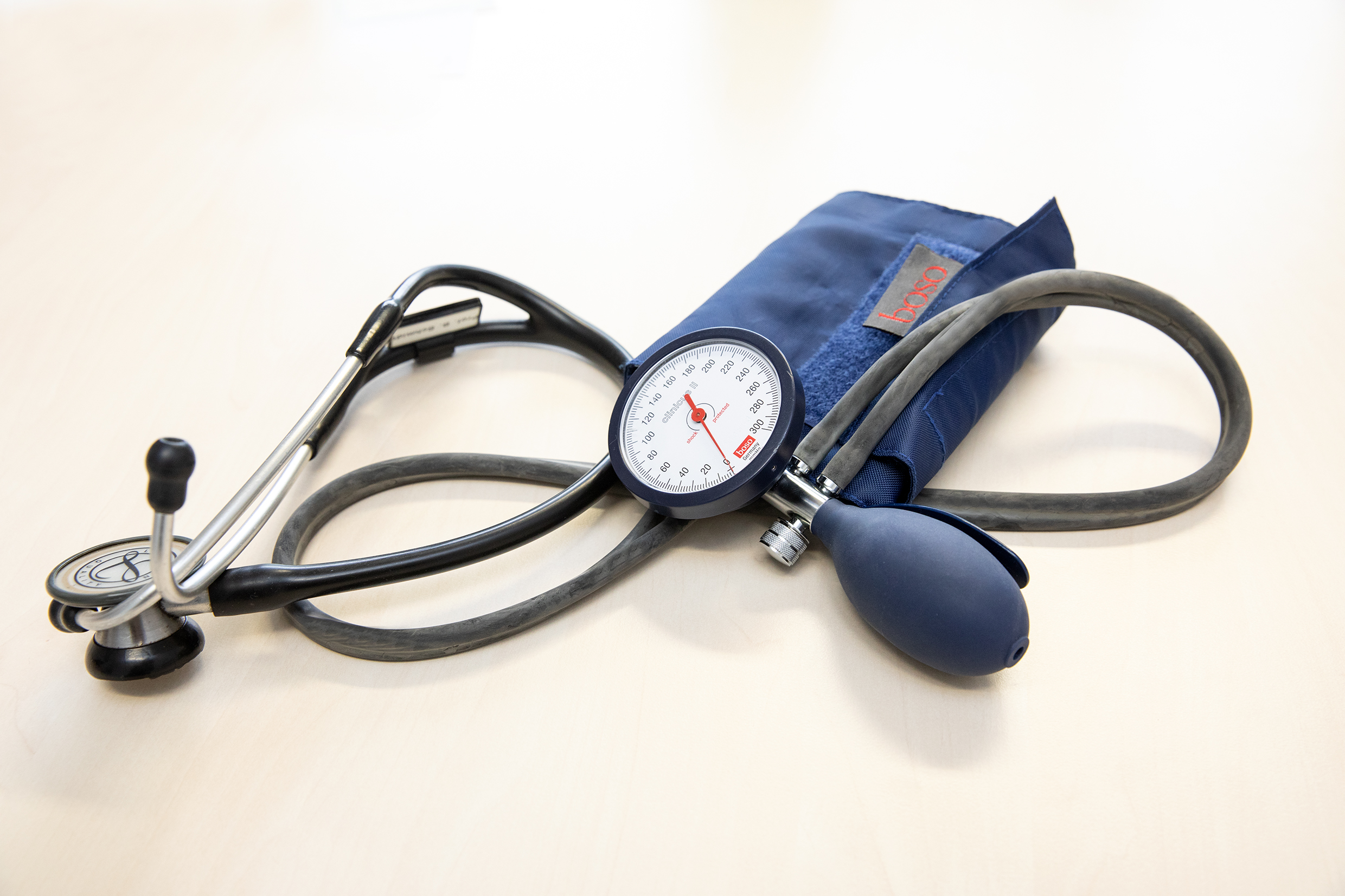 A blood pressure monitor is lying on a table