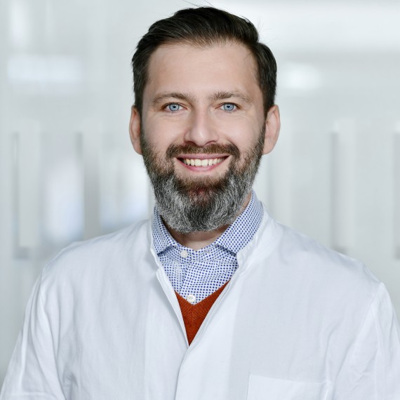 Dr. Denys Pogozhykh