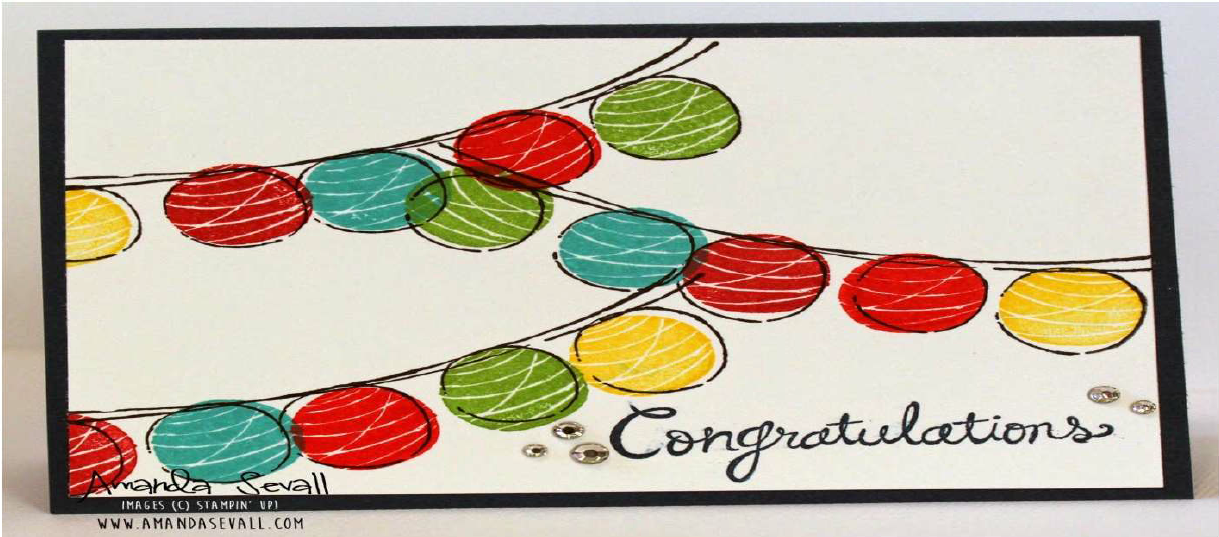 Eine Karte mit einer Zeichnung von bunten Lampions und dem Text "Congratulations" Copyright: www.amandasevall.com